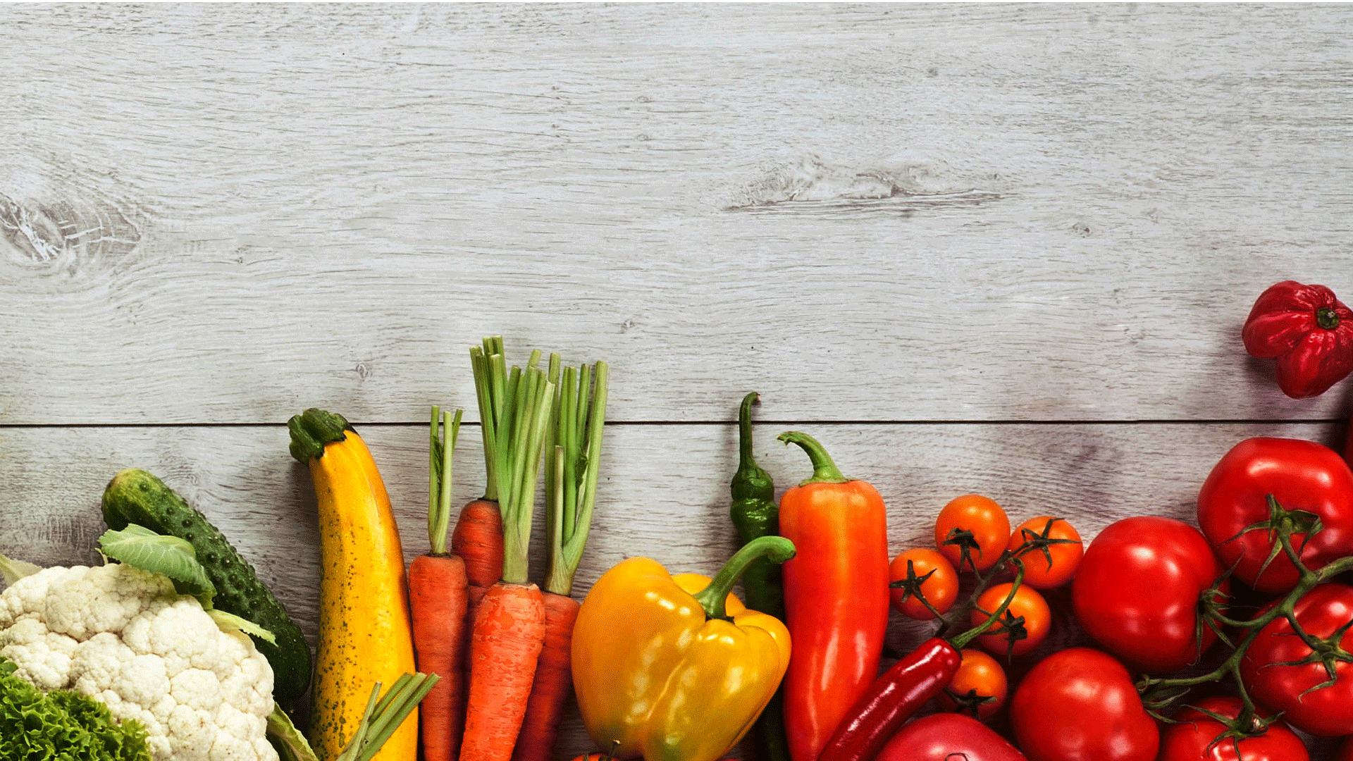 Image of Fresh Vegetables Scattered Along Table