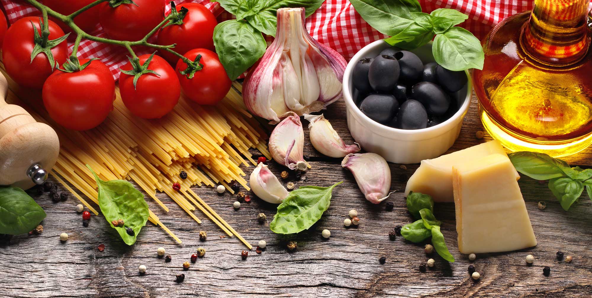 Image of Italian Ingredients Scattered Along Table